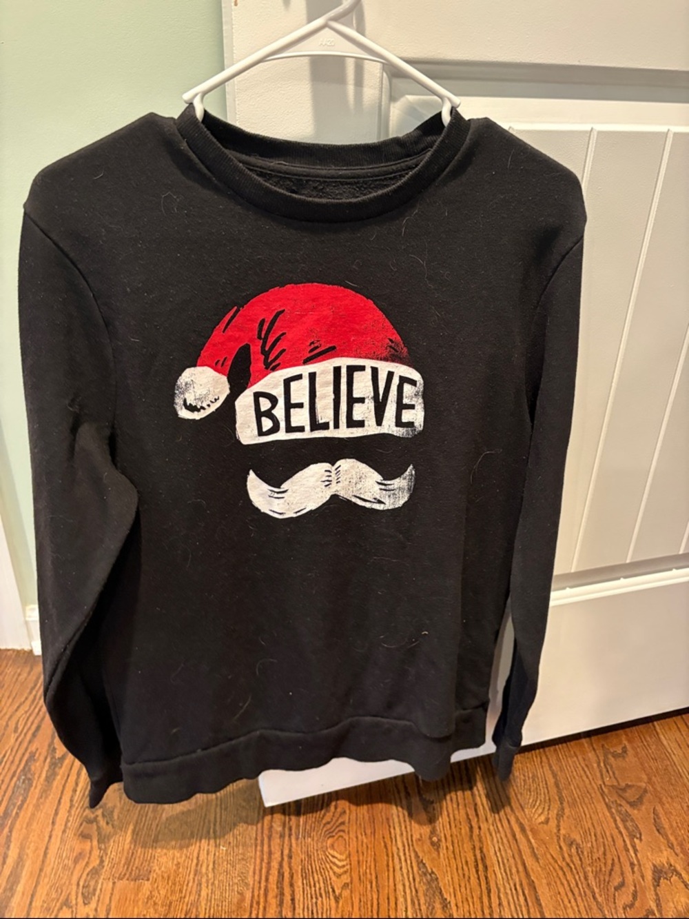 Old Navy Black Crewneck Sweater with Red Santa Hat Graphic